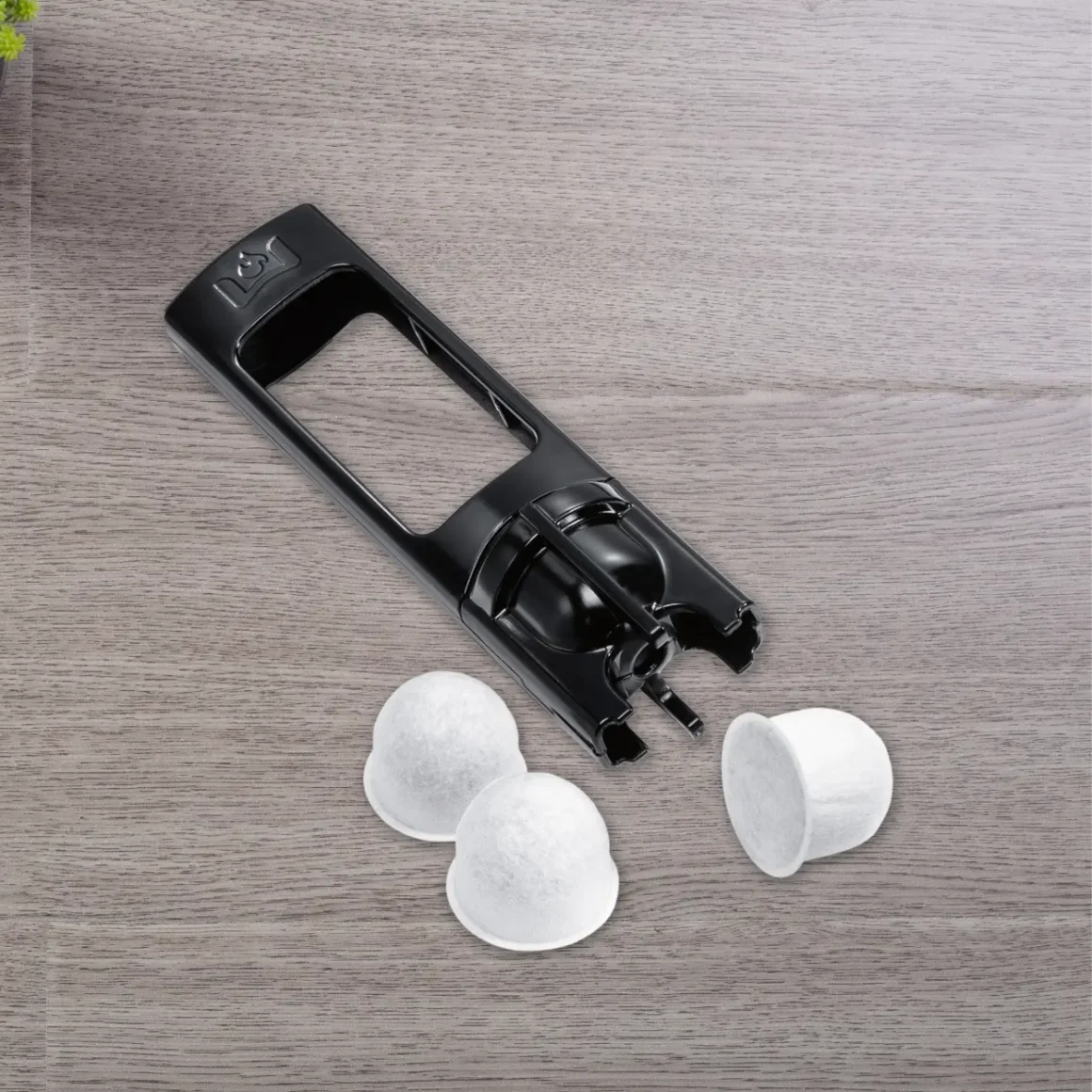 a coffee machine accessories on a surface