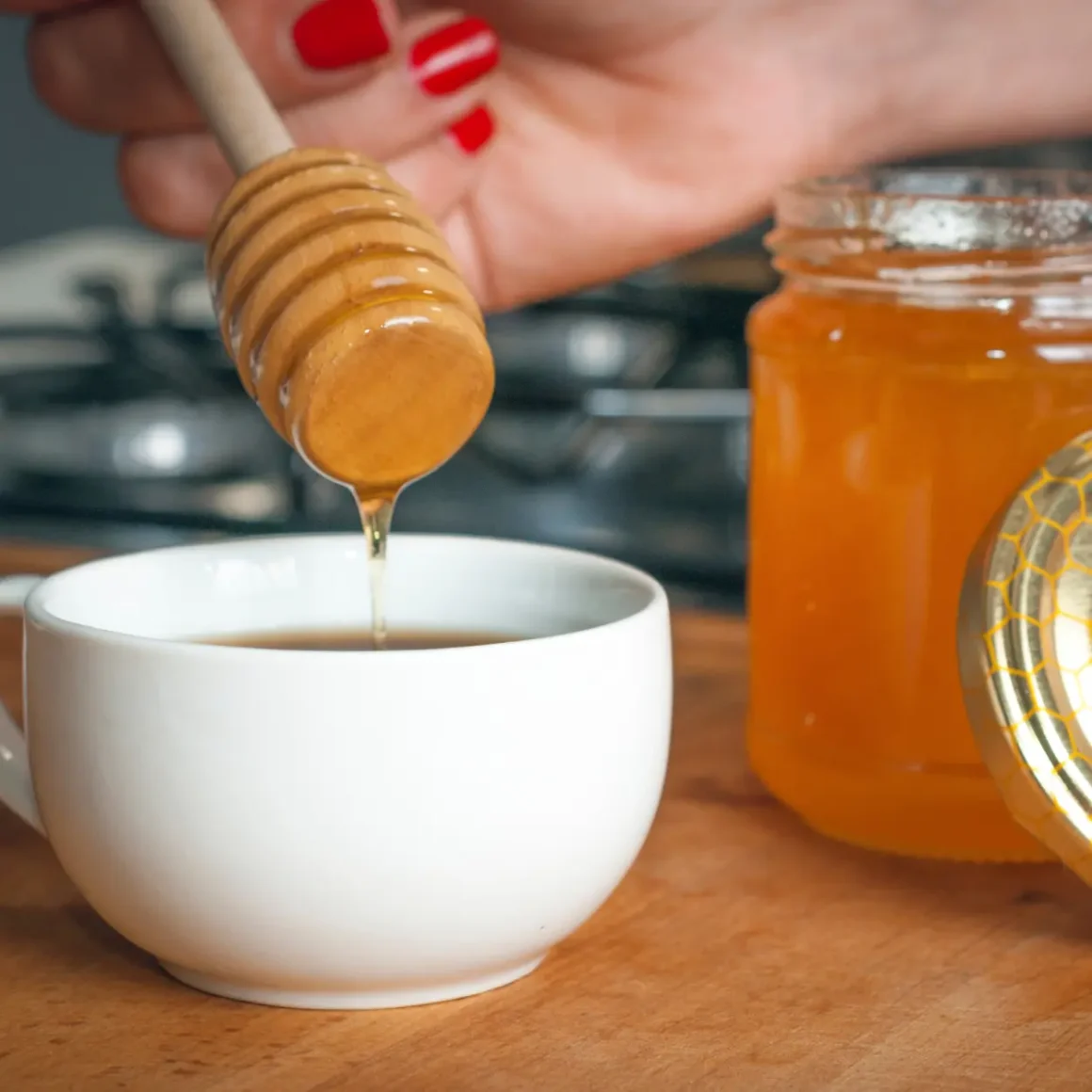 honeycomb oozing into a cup