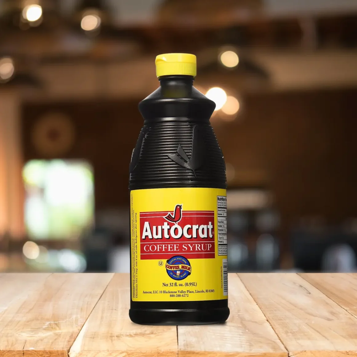 a bottle of autocrat coffee syrup on a table