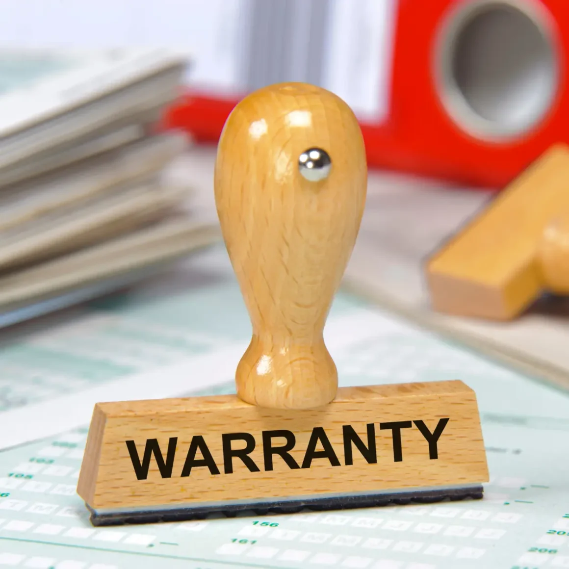 a wooden stamp with a handle