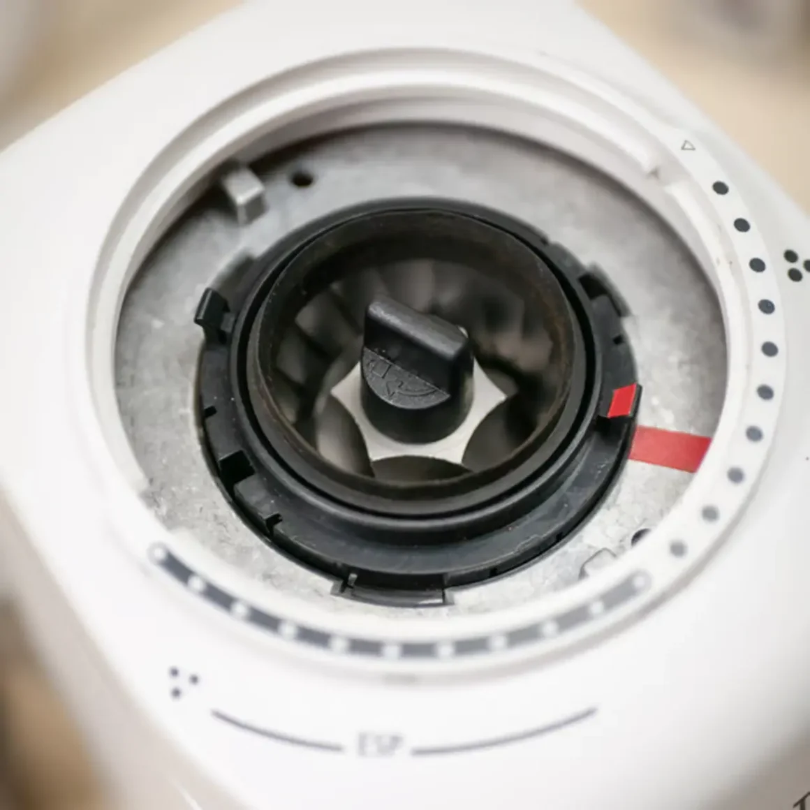 a close up of a burr of a turkish coffee grinder