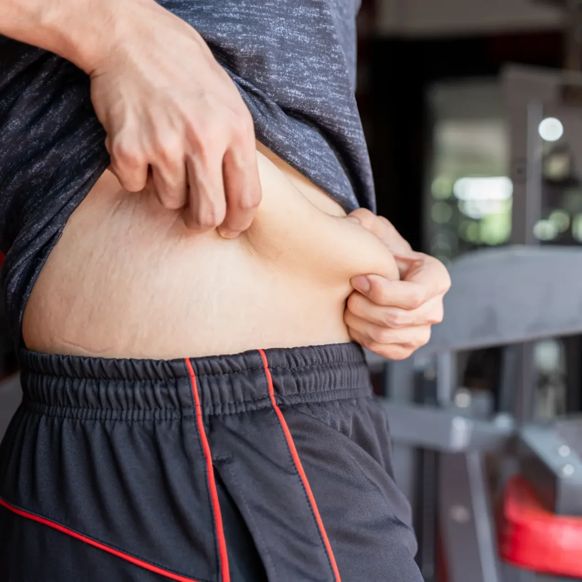 a person holding their stomach