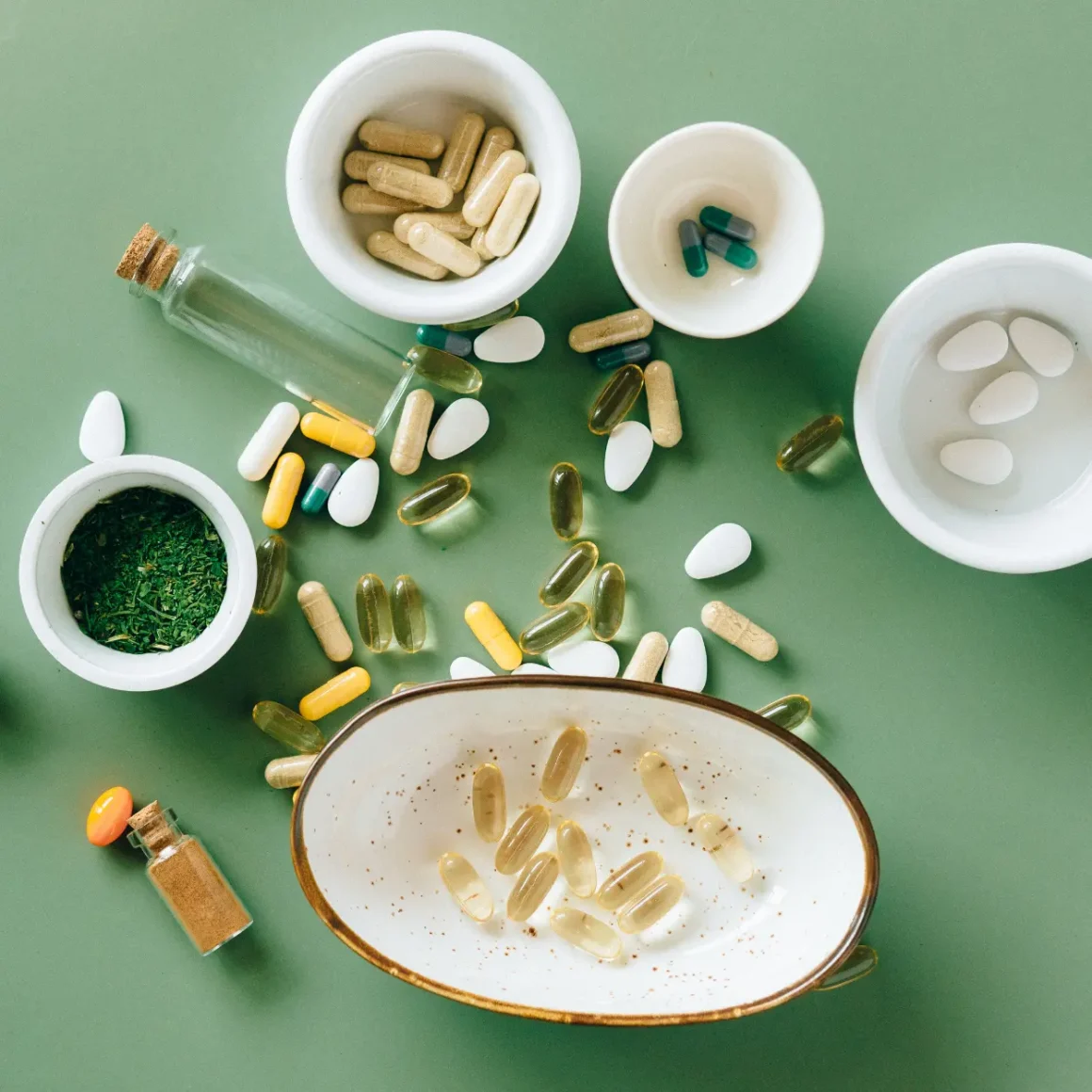 a group chlorogenic acid supplements pills and bottles