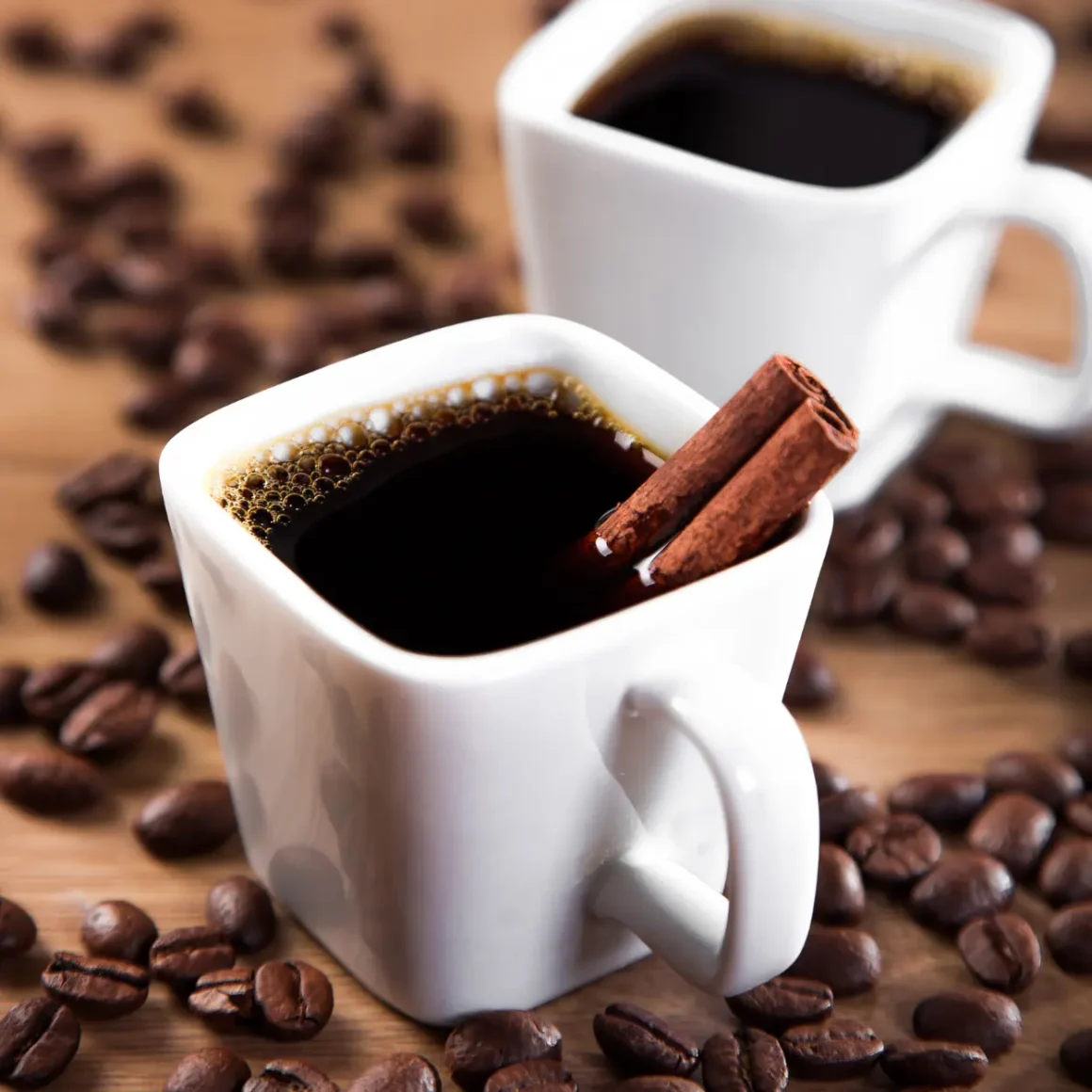 a black brew with cinnamon sticks