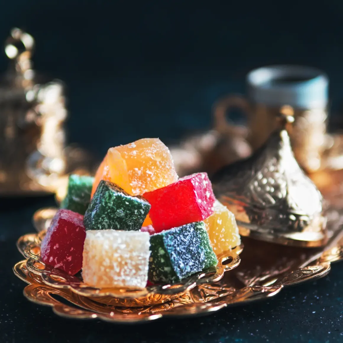 a plate of colorful sugar cubes