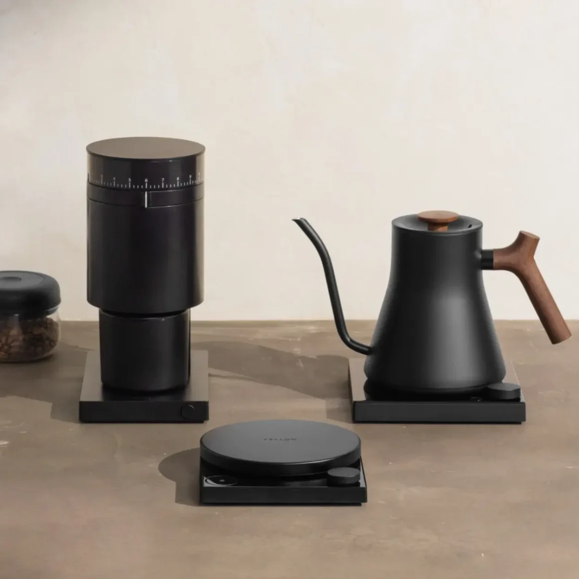 a black fellow opus coffee grinder on a table