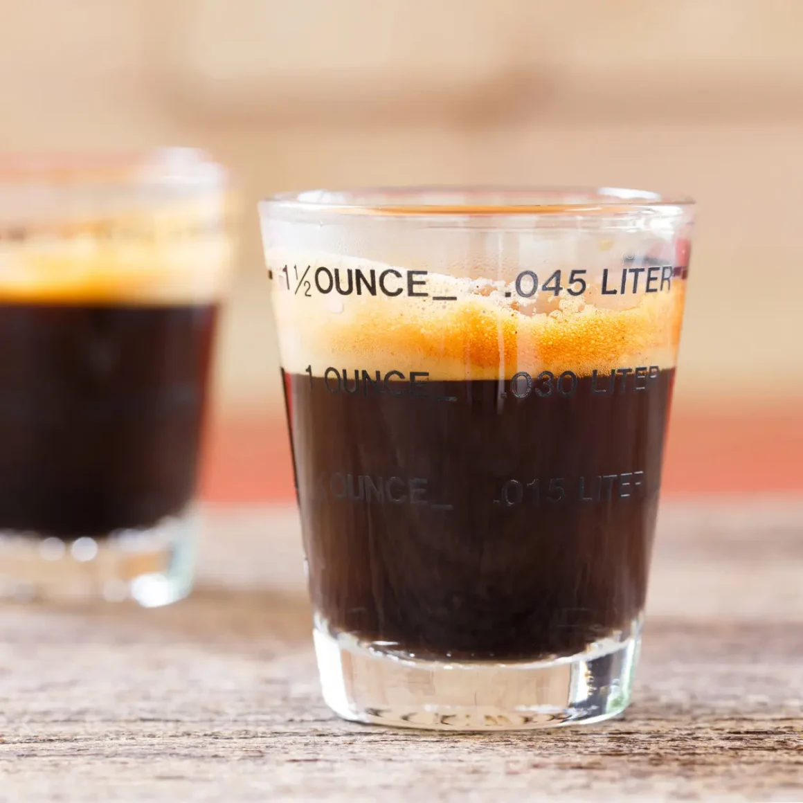 two demitasse cups with espressos