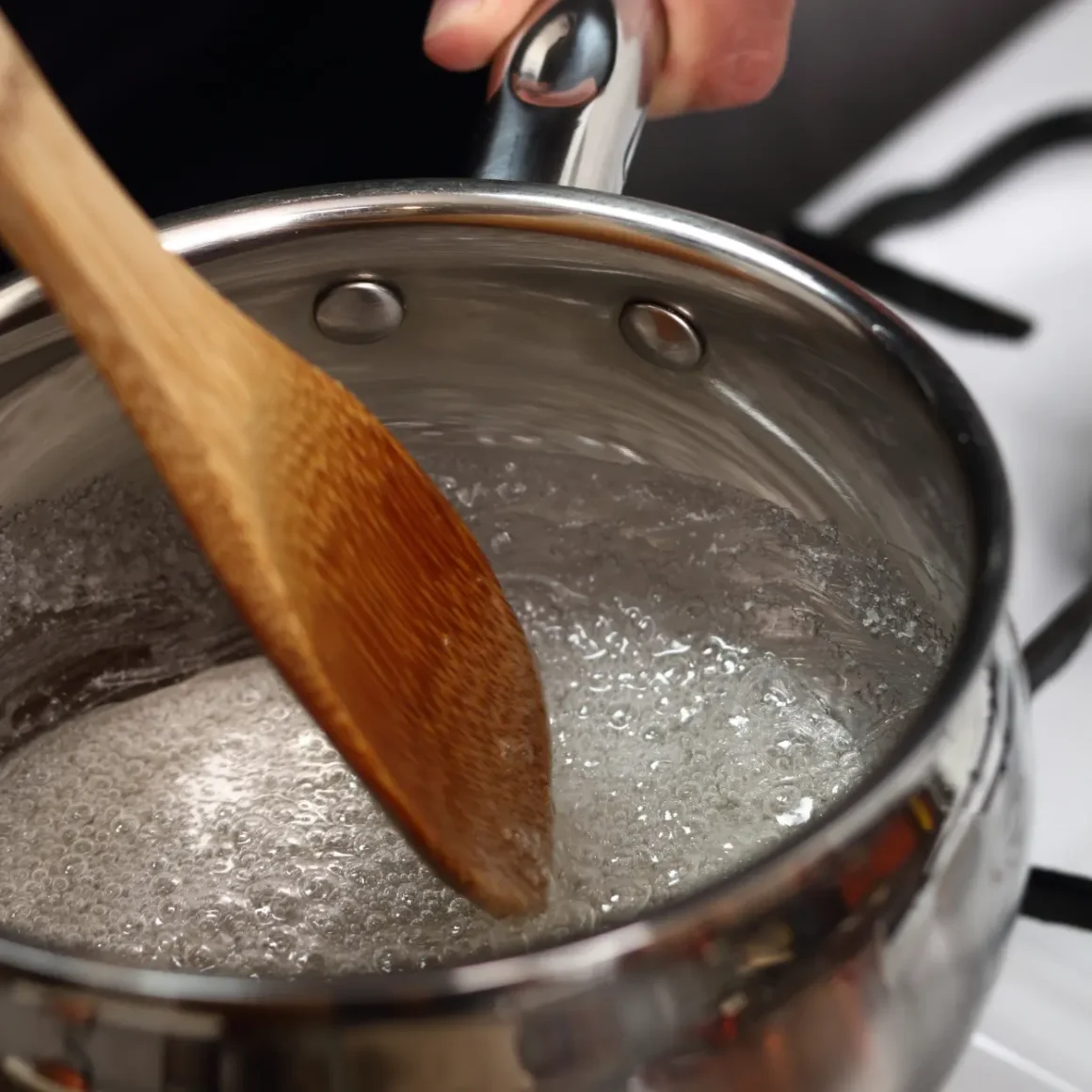 a wooden spoon in a pot