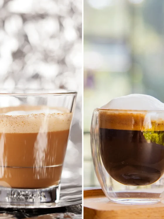 a glass cup of cortado and a cup of macchiato coffee
