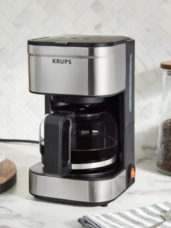 a krups simply brew 5-cup coffee maker on a counter