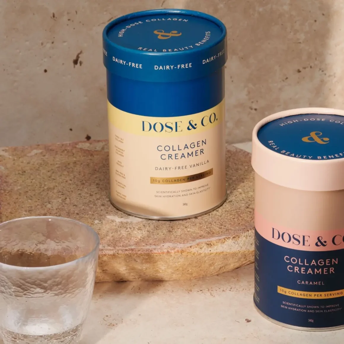 a group of containers of dose & co pure collagen creamer and a glass of water