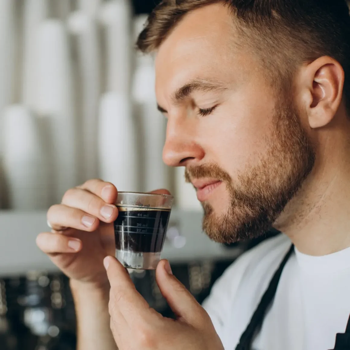 barista smelling a shot of turkish coffee