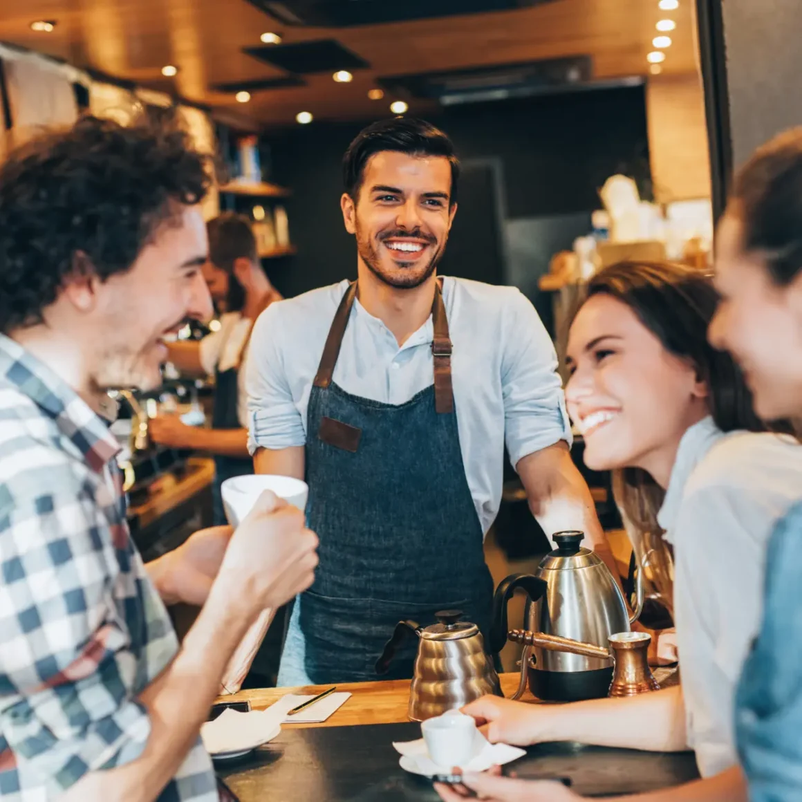 a group of people in a cafe