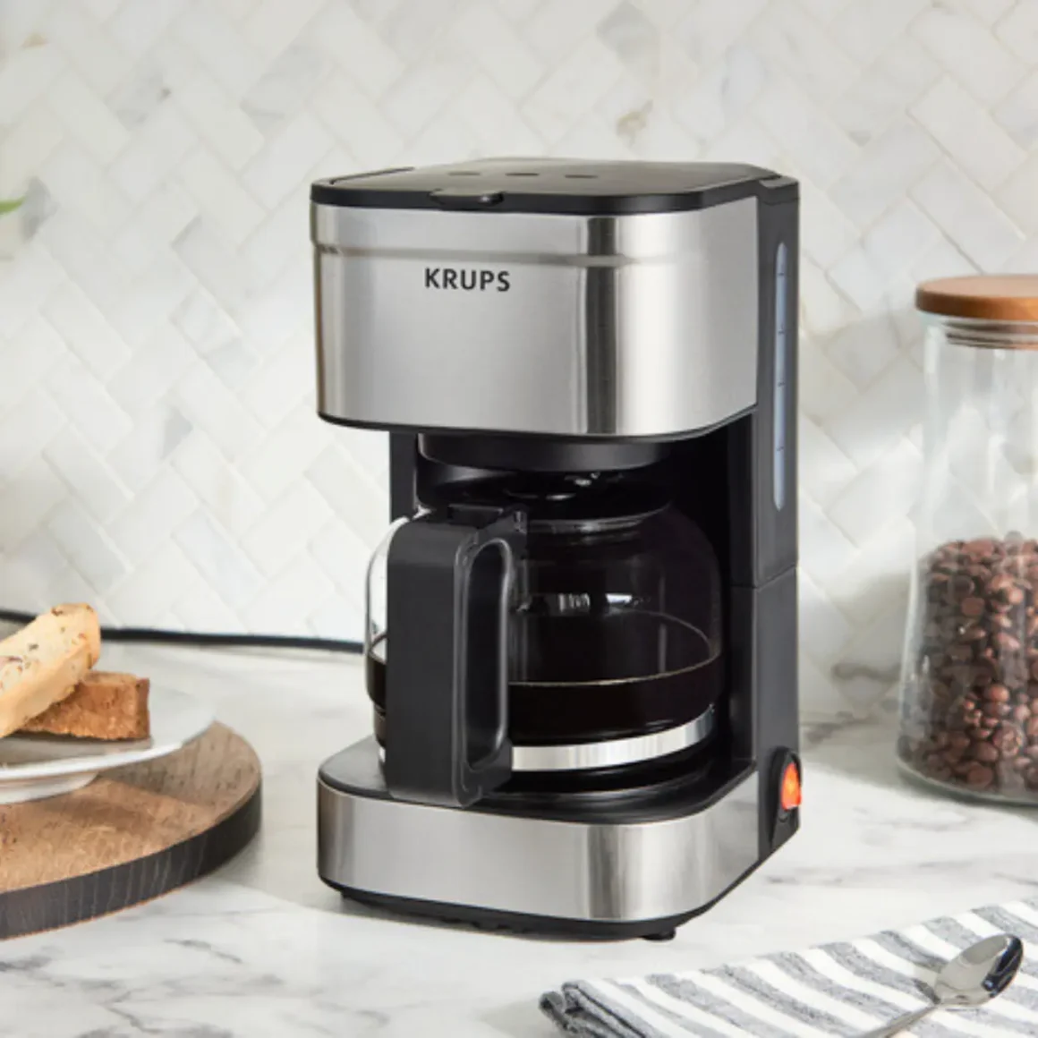 a krups simply brew 5-cup coffee maker on a counter