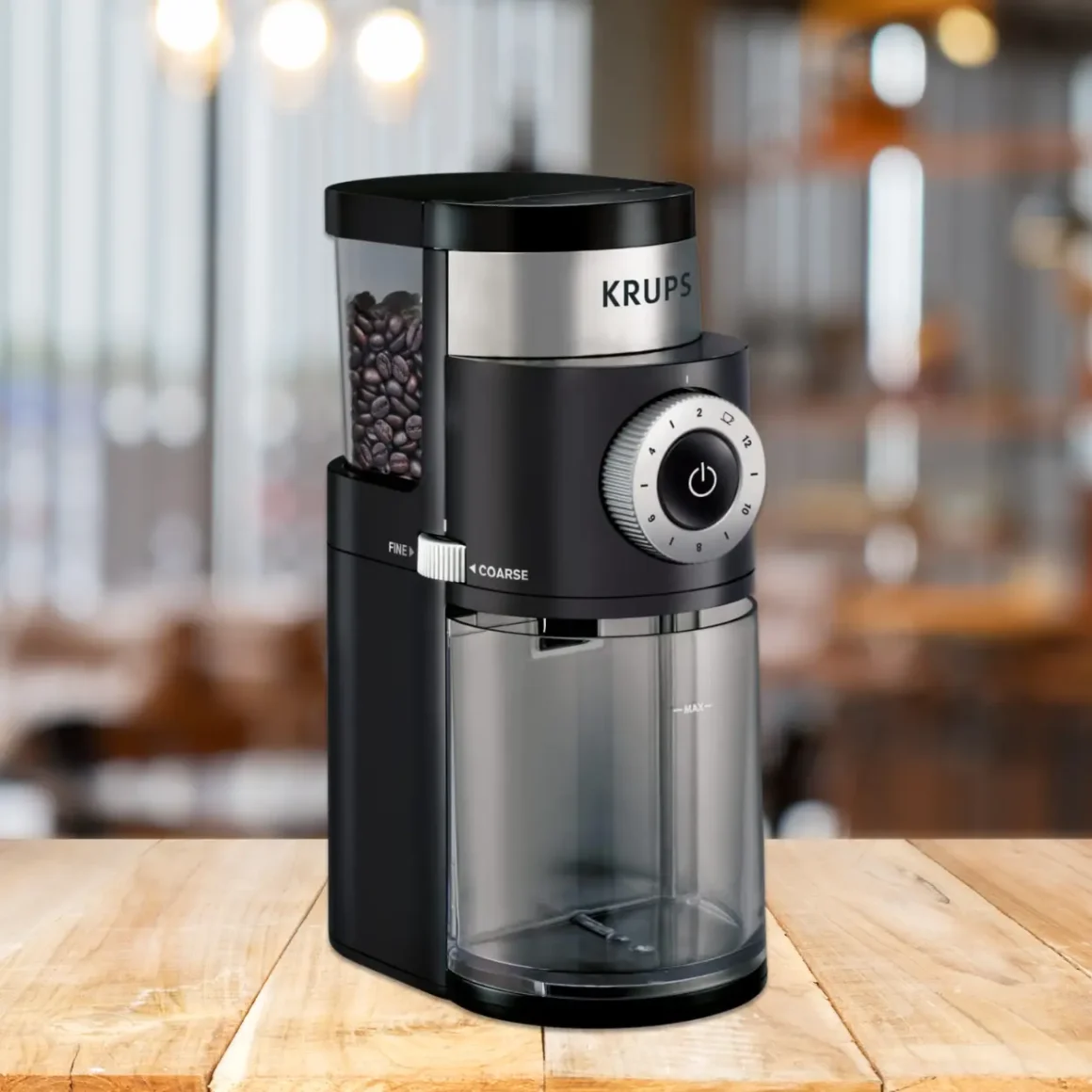 a krups precision coffee burr grinder on a wooden surface