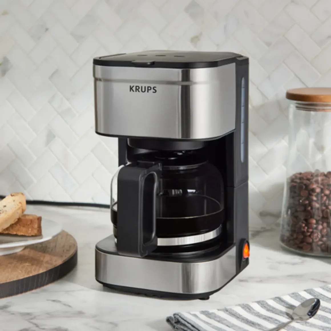 a krups simply brew 5-cup drip coffee maker coffee maker on a counter