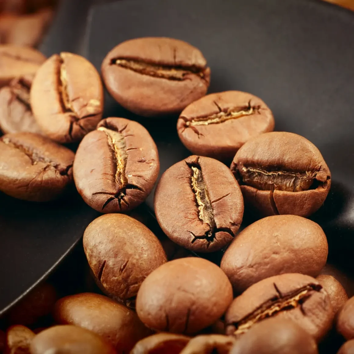 a pile of light roast coffee beans