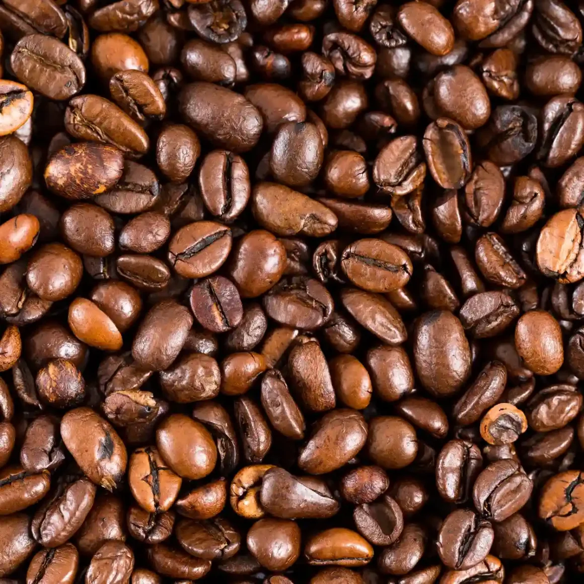 a pile of medium roast coffee beans