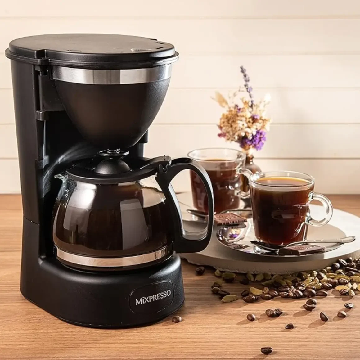 a mixpresso 5-cup drip coffee maker coffee maker and cups of coffee