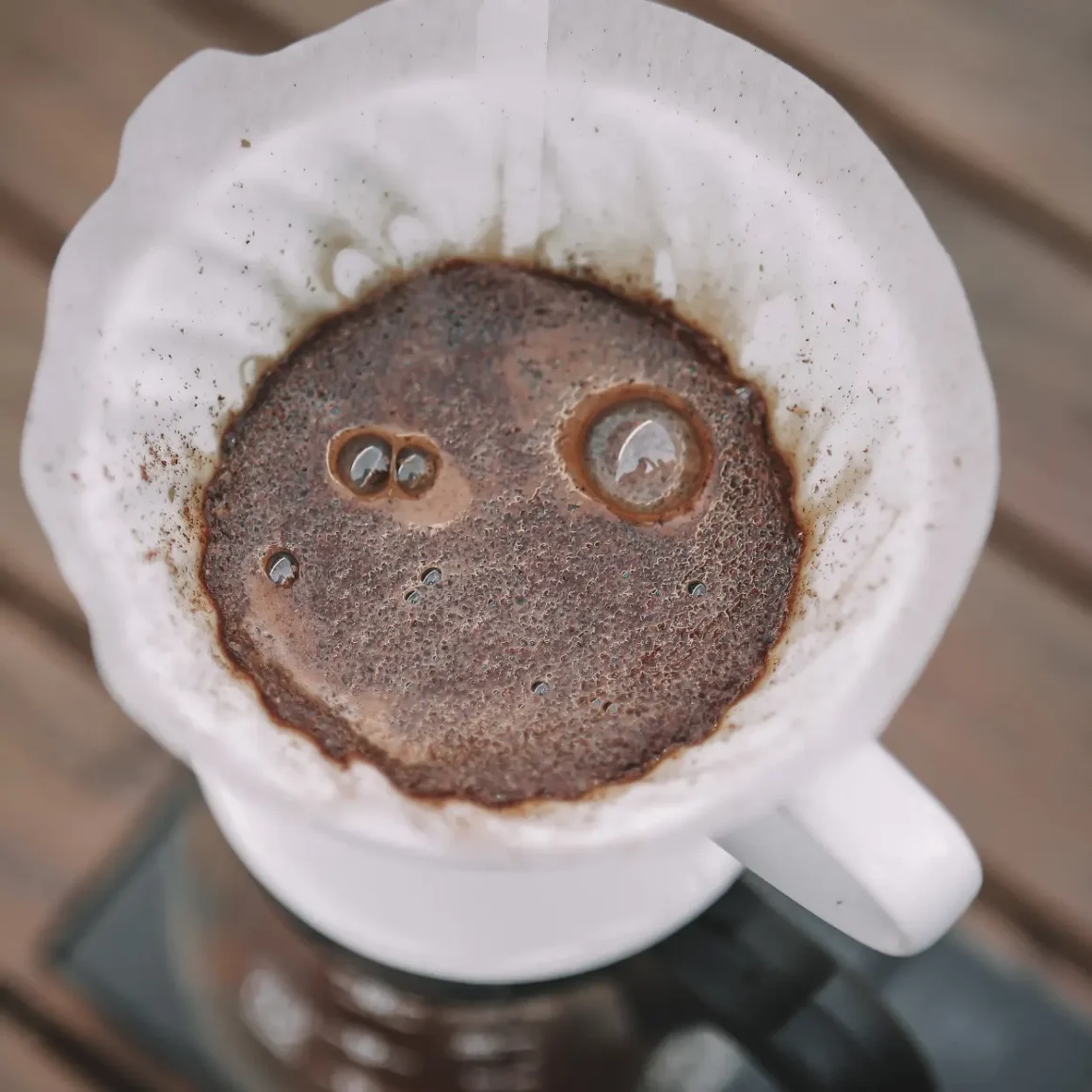a coffee filter in a white cup