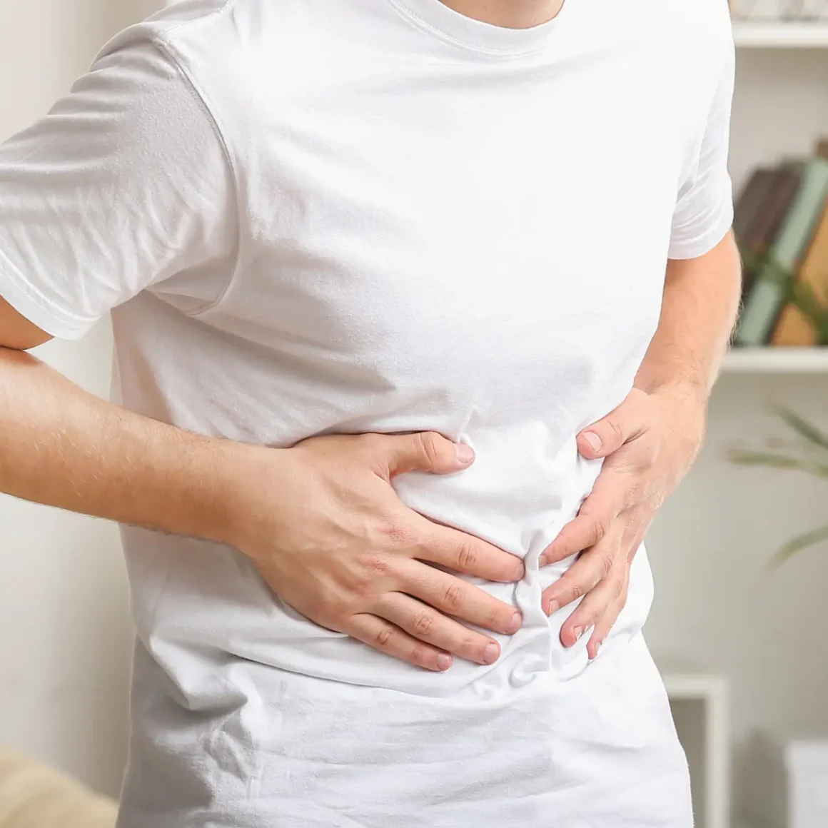 a person holding his stomach