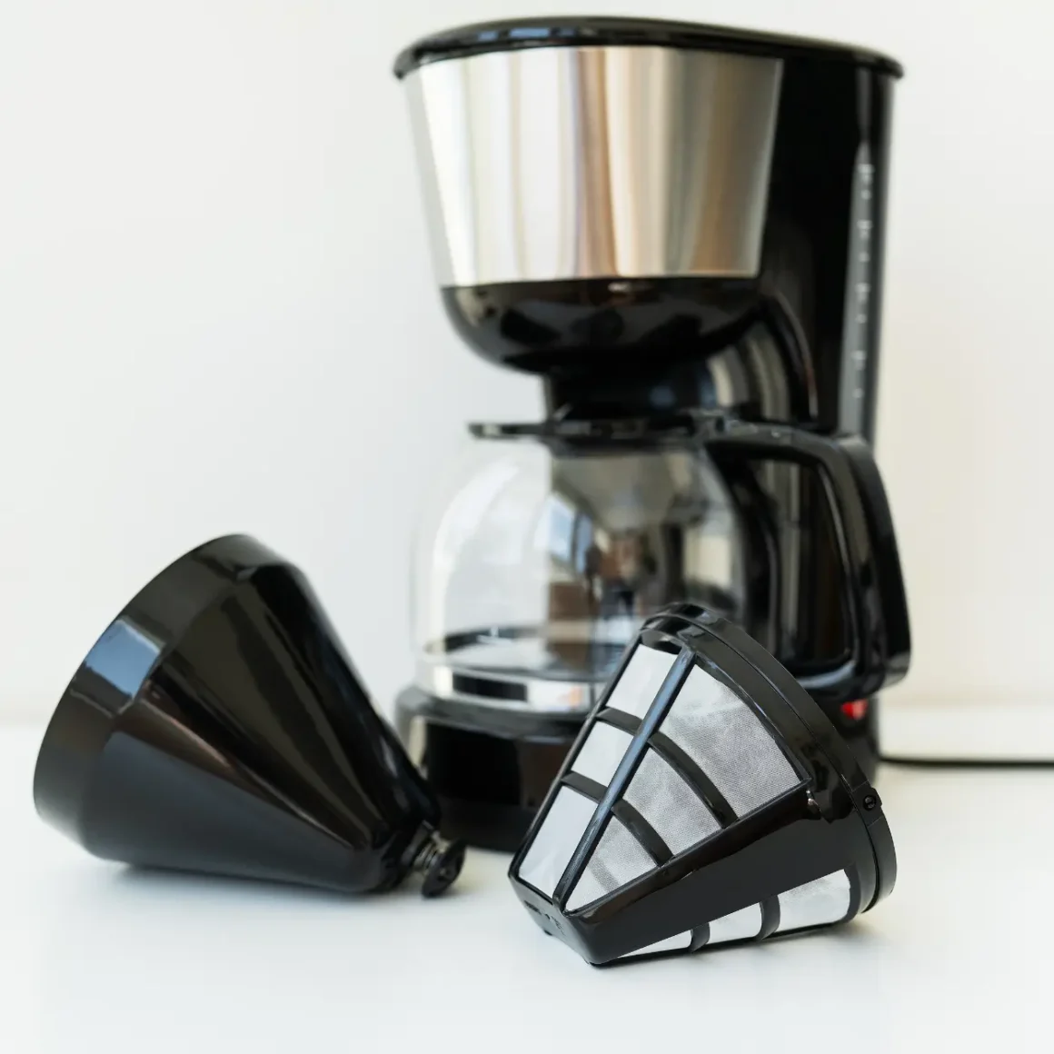 a small coffee maker with filter