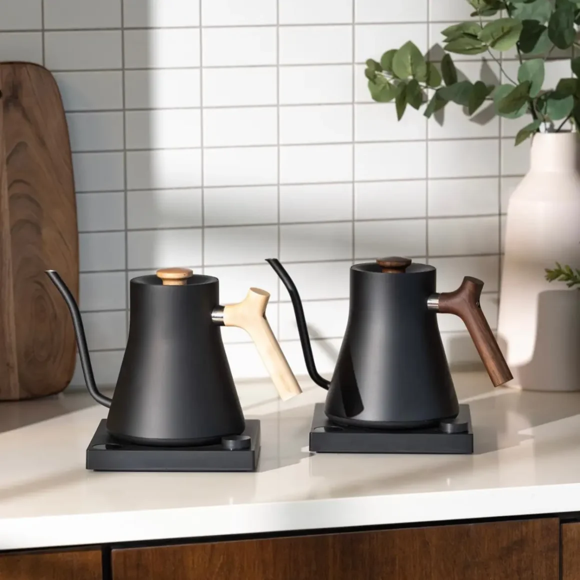 a couple of fellow stagg ekg electric kettles on a counter