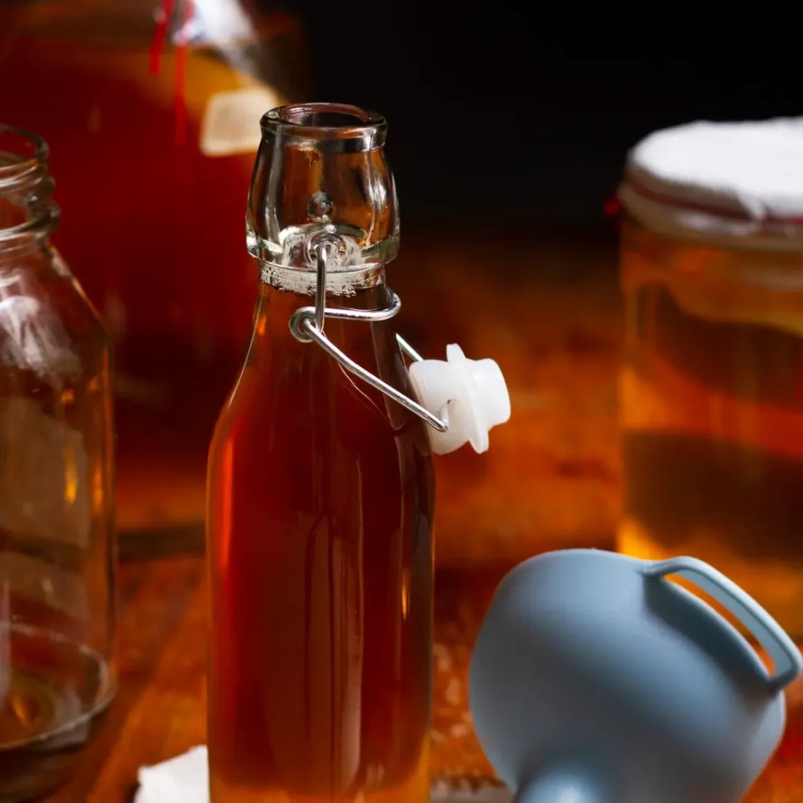 a glass bottle brown sugar syrups with a lid