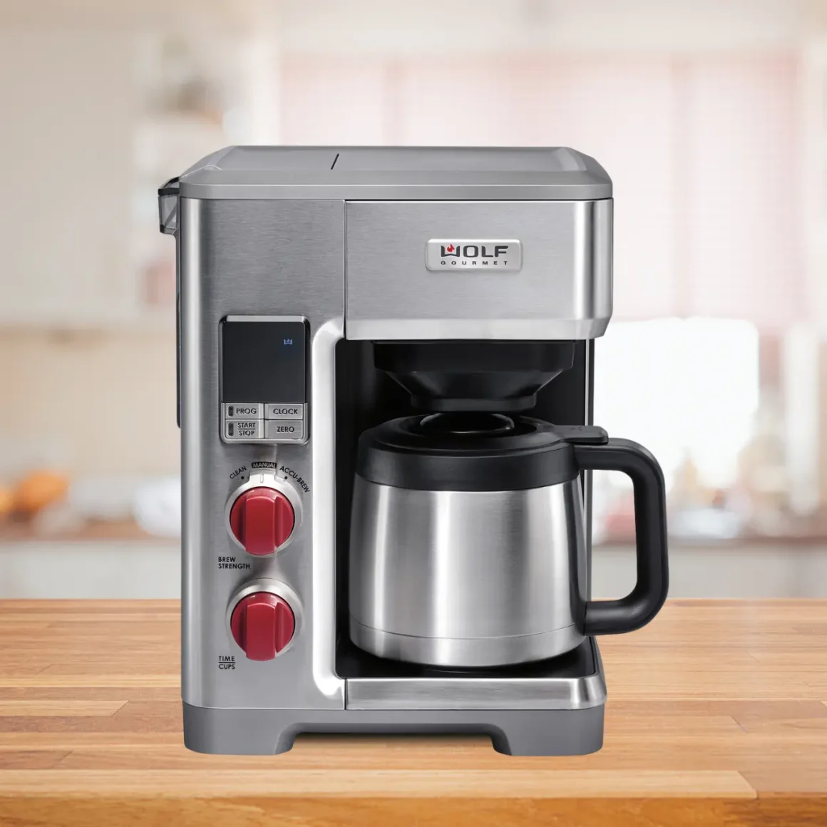 a wolf gourmet 10 cup coffee maker on a wooden surface