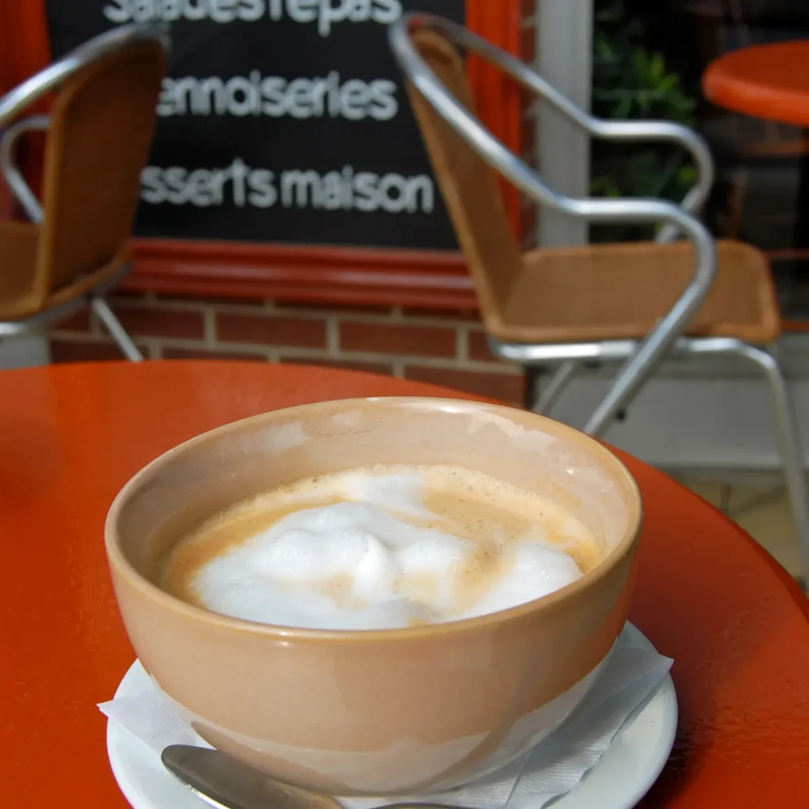 a cup of caffe misto on a table