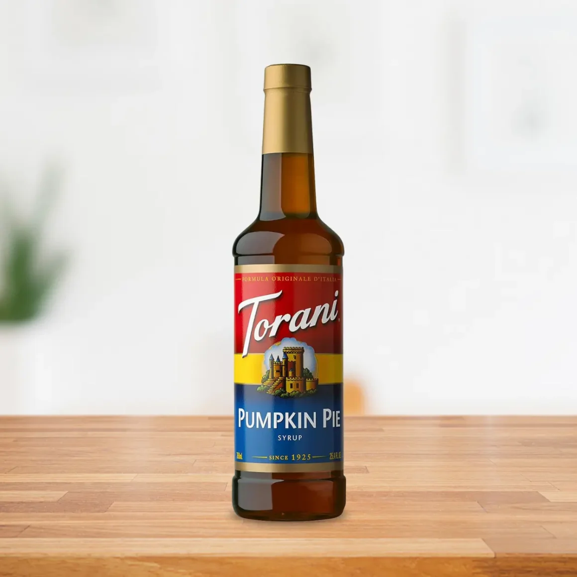 a bottle of torani pumpkin pie coffee syrup on a table