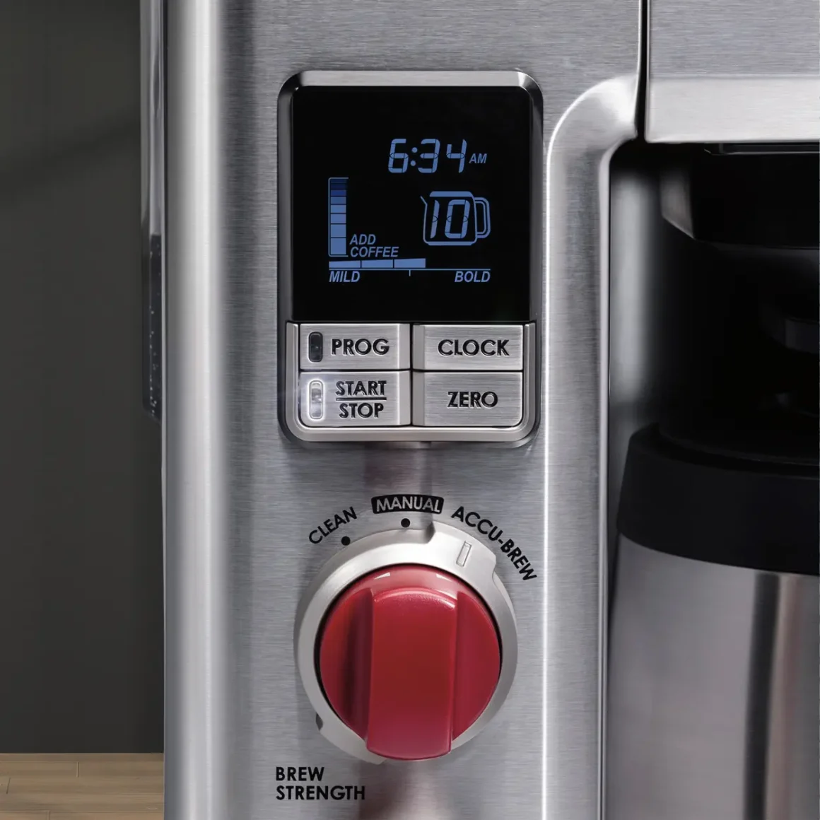 a close up of a coffee maker screen and switches