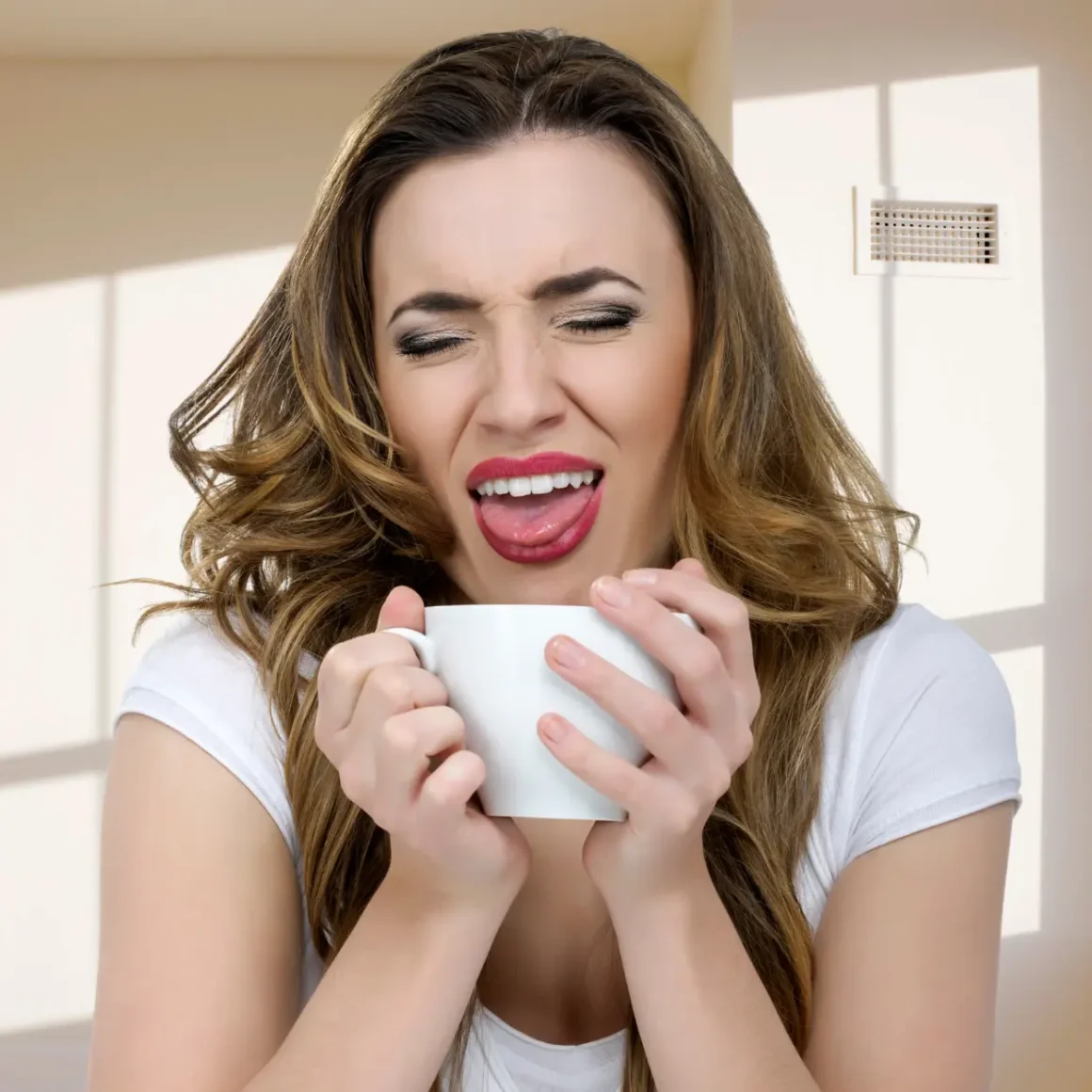a woman in disgust tasting burnt coffee