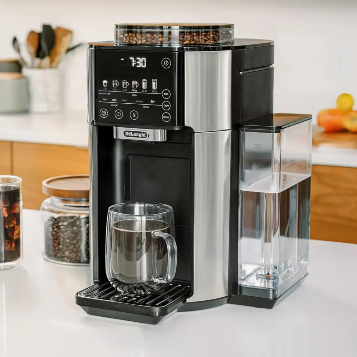 a delonghi truebrew drip cup coffee maker on a kitchen counter
