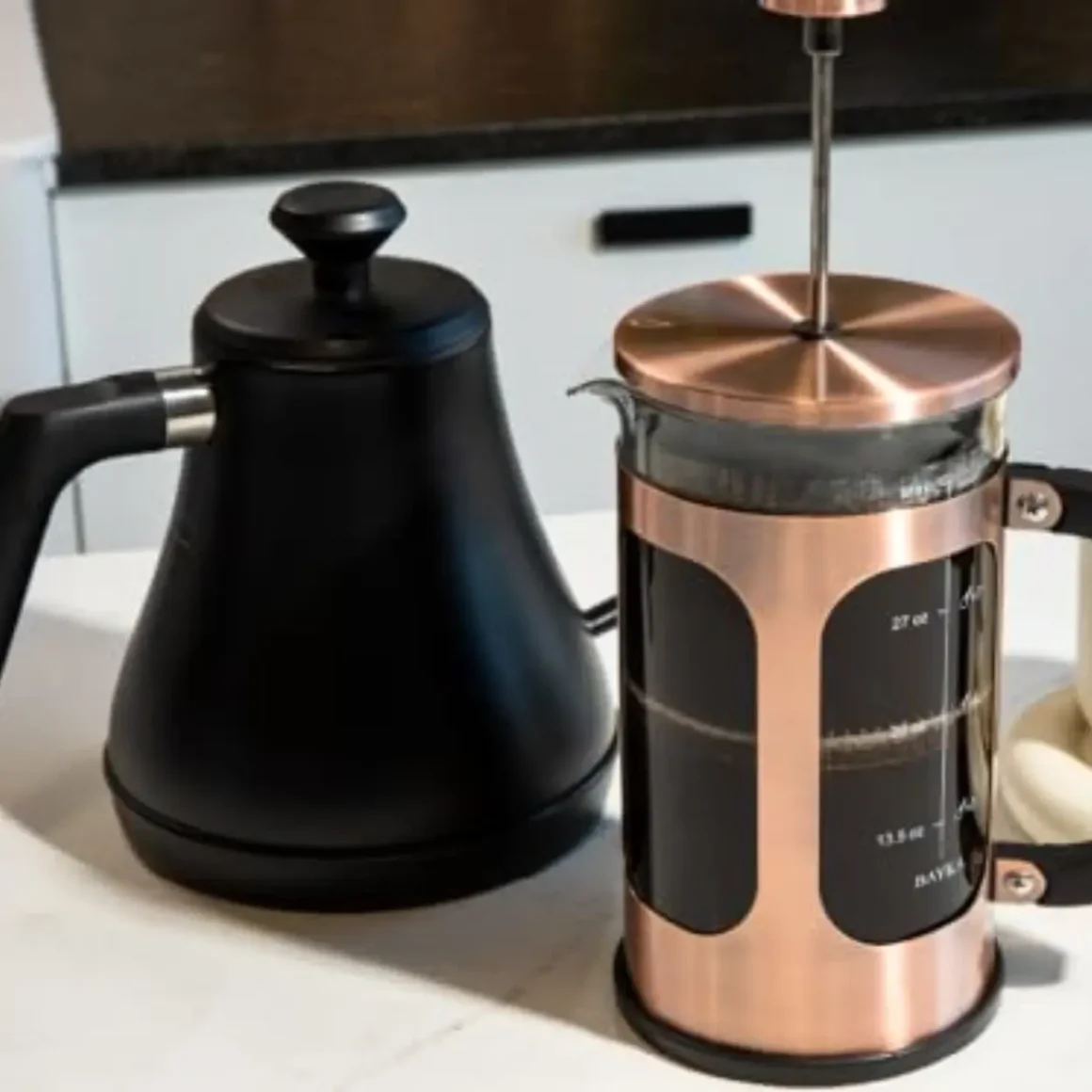 a bayka french press coffee maker and a coffee pot