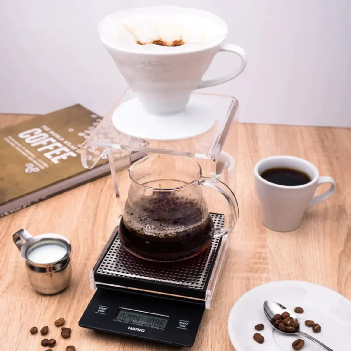 a pour-over coffee stand on a scale