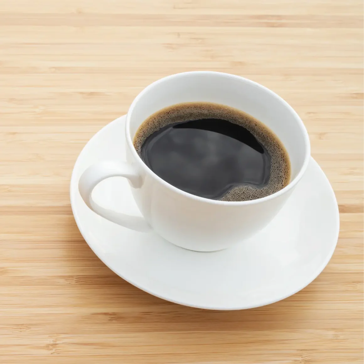 a cup of coffee on a saucer