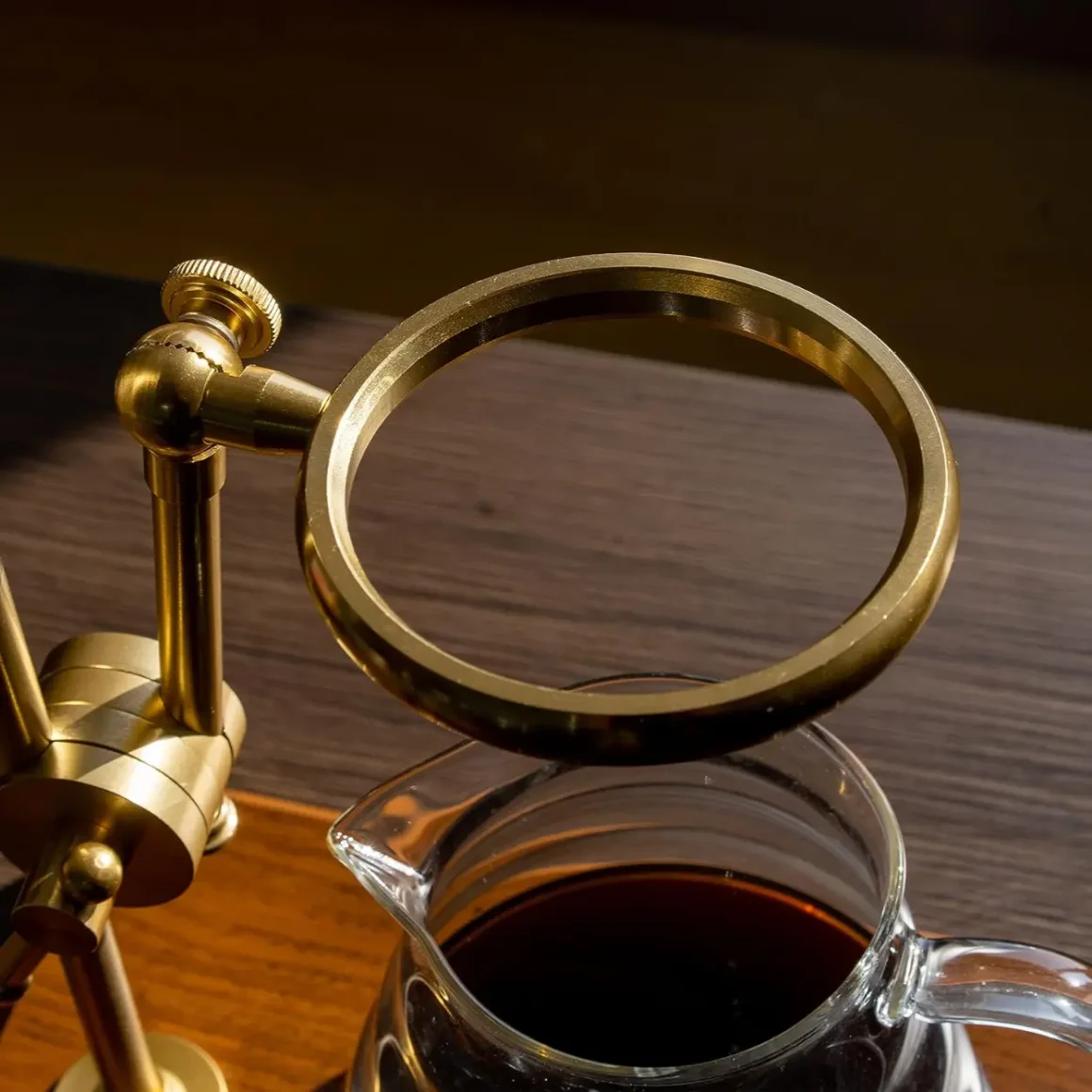 a pour-over coffee stand and a glass container