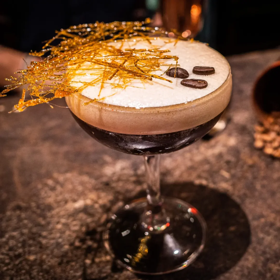 an espresso based beverage in a glass