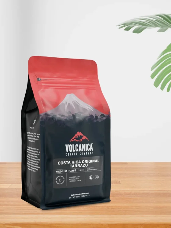 a bag of volcanica single origin tarrazú costa rican estate coffee on a table