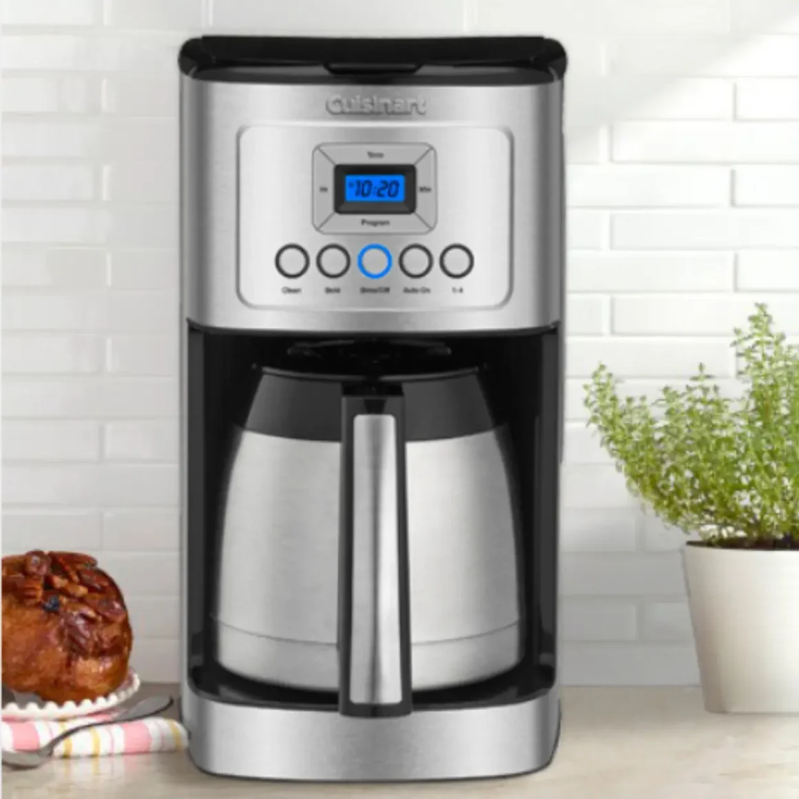 a cuisinart stainless steel 12-cup coffee maker on a counter