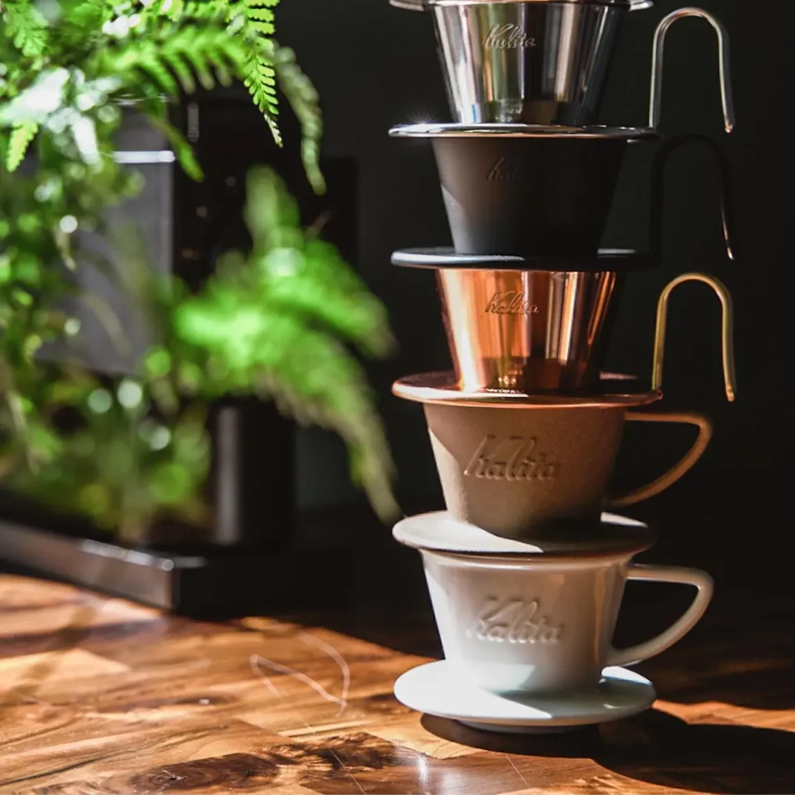 a stack of kalita wave coffee cups