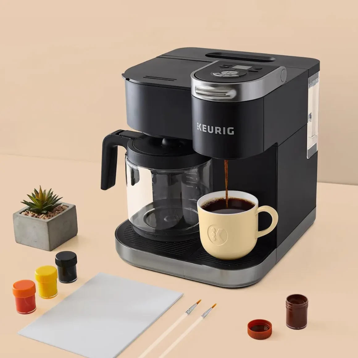 a keurig k-duo coffee maker with a cup of coffee