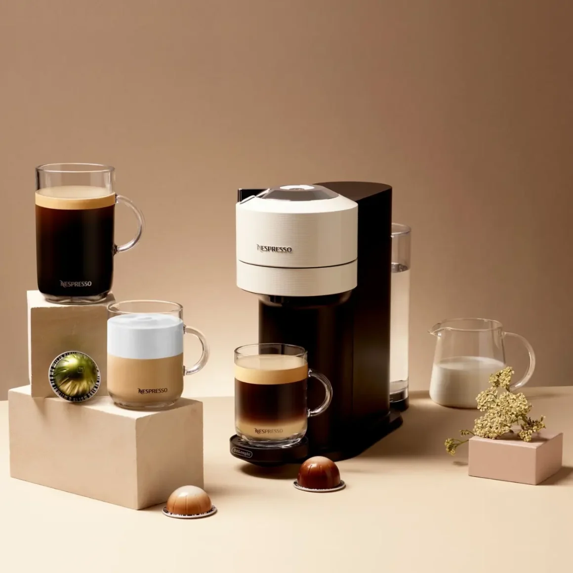 a coffee machine and cups of coffee on a counter