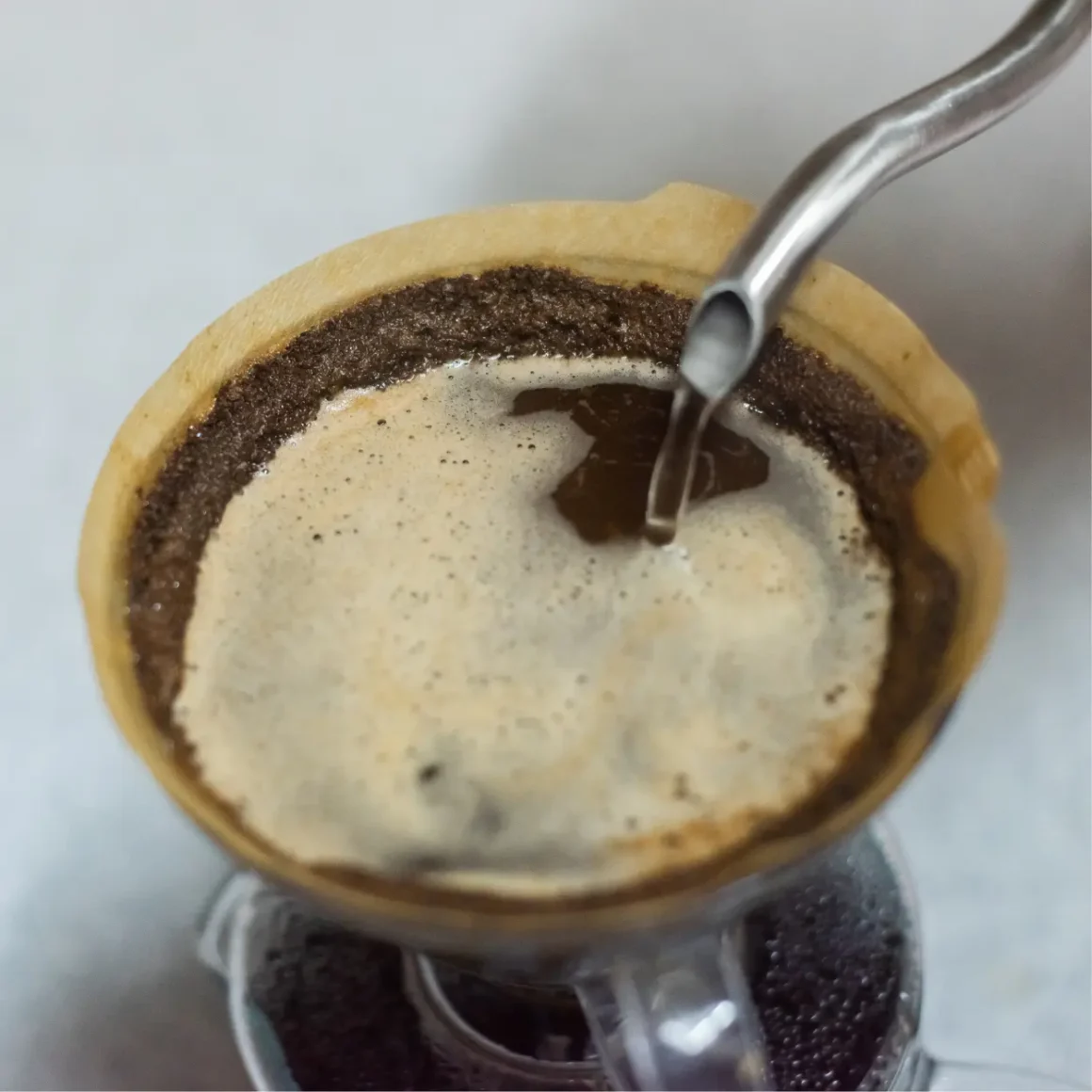 a coffee filter with a metal handle