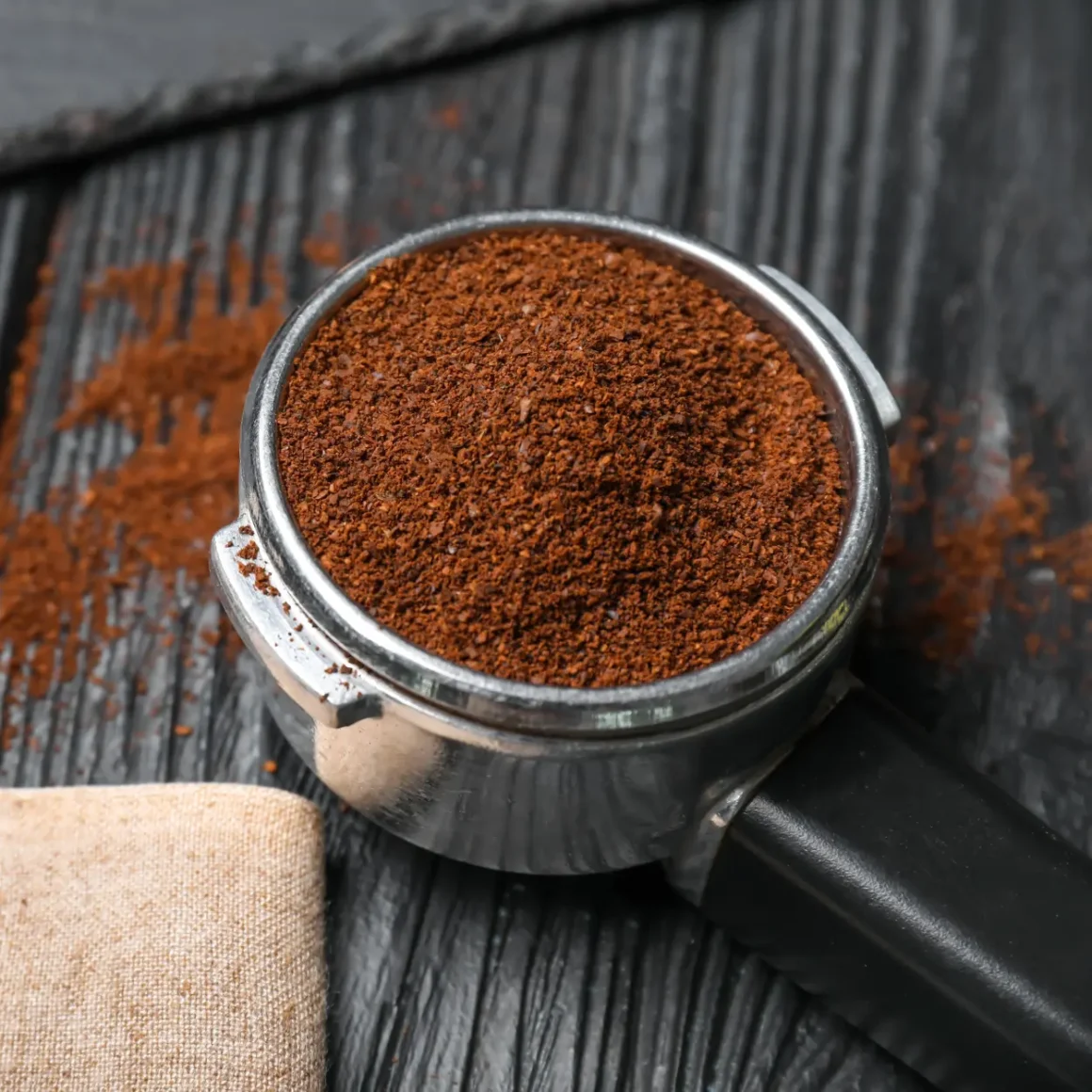 a ground coffee in a bottomless portafilter