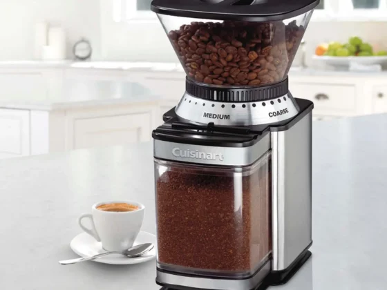 a supreme grind cuisinart burr coffee grinder with a cup of coffee on a saucer