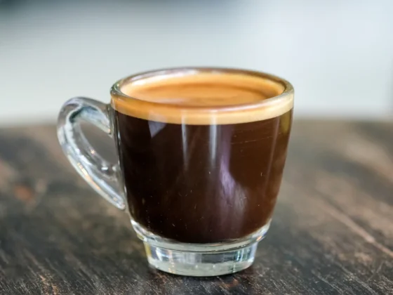 a glass cup of doppio espresso
