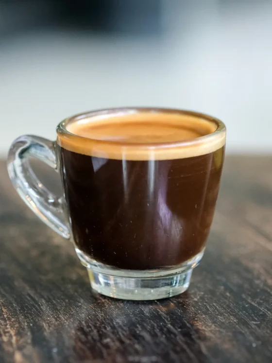 a glass cup of doppio espresso