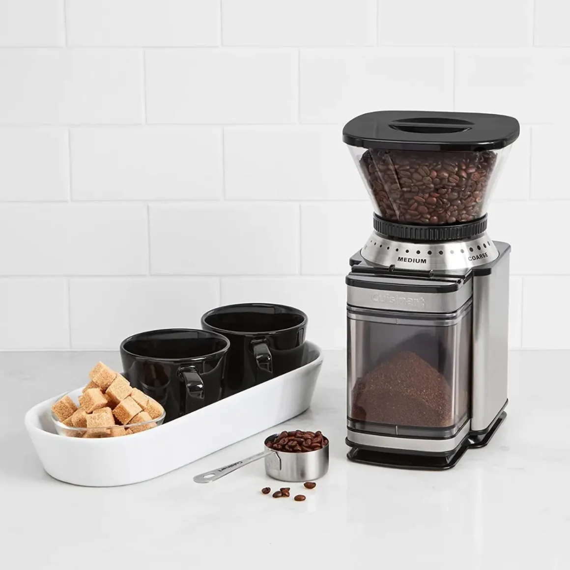 a supreme grind cuisinart burr coffee grinder with coffee beans and cups
